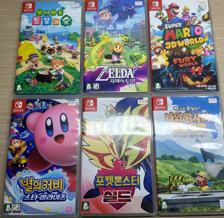 닌텐도칩 (동물의숲, 젤다 지혜의투영, 슈퍼마리오3D월드, 별의커비, 포켓몬스터 실드, 짱구 나와박사의여름방학 이미지