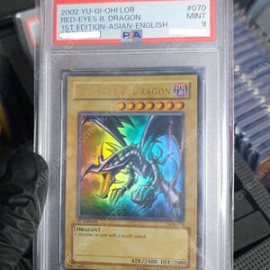 유희왕카드 psa9 붉은눈의흑룡 lob 1st 초판 퍼에 이미지
