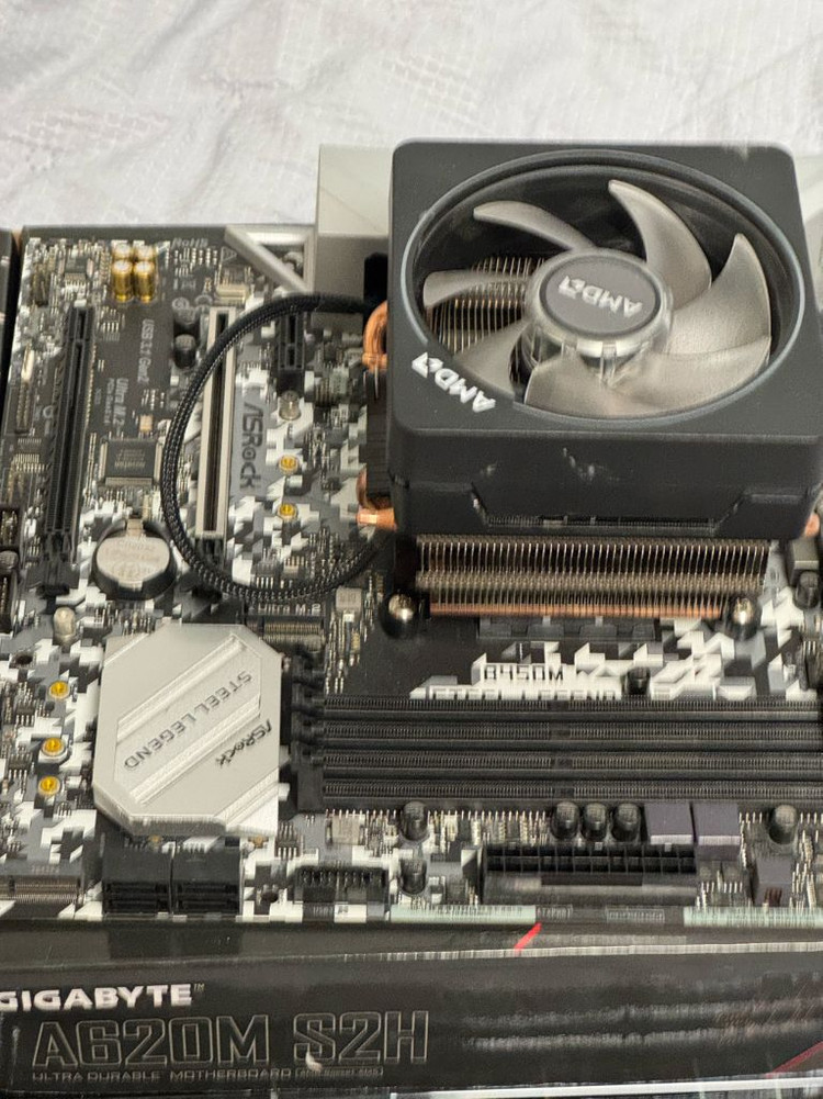 라이젠 3900x + b450m 메인보드 +쿨러 이미지