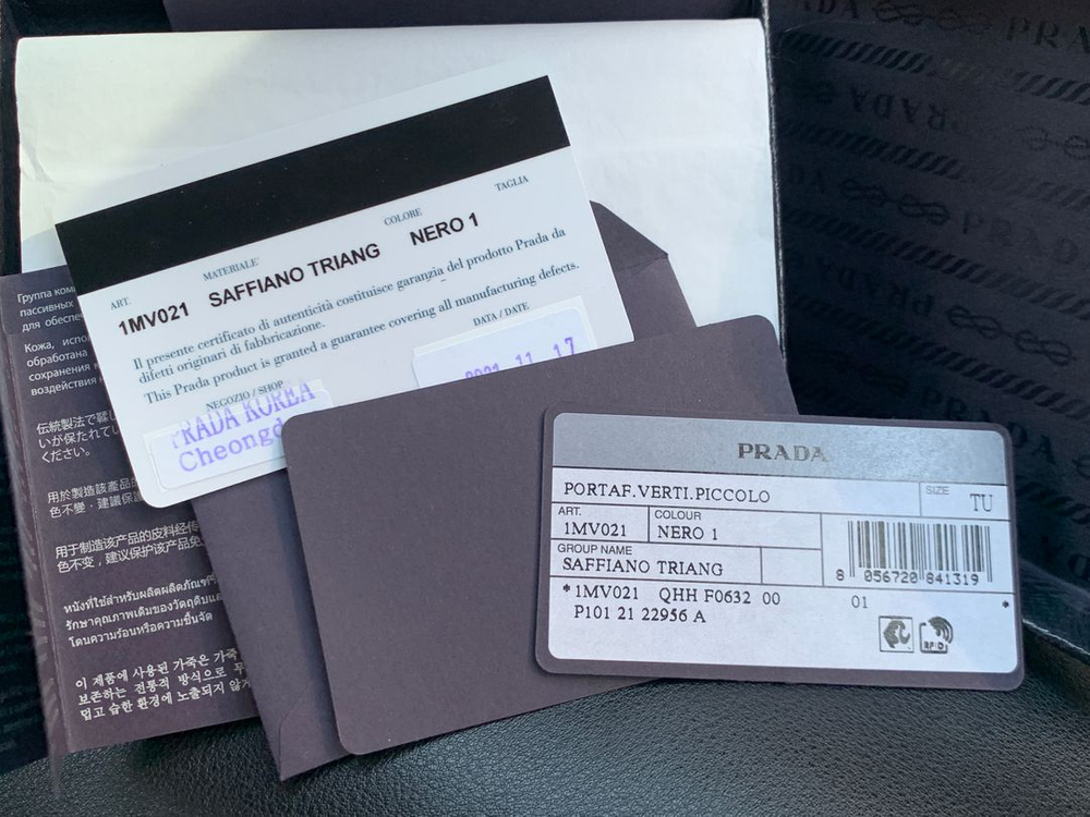 [새상품] 프라다 사피아노 트라이앵글 로고 반지갑 이미지