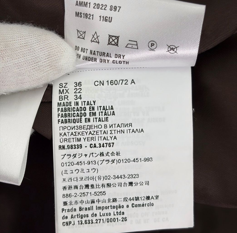 [36] 미우미우 여성 백로고 울 플래드 오버사이즈 체크 롱 코트 러스트 이미지