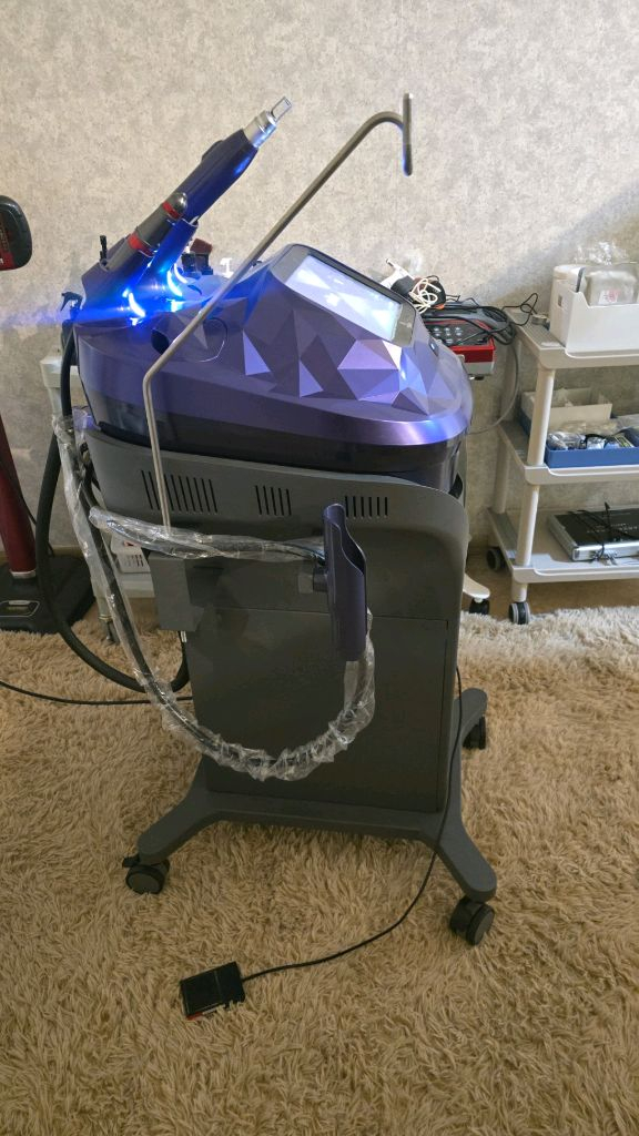 트라이엄 레이저 피부 미용기기 이미지