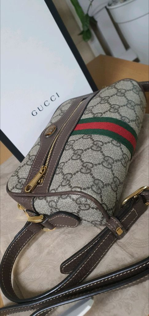 구찌 오피디아 크로스백/카메라백 미니 정품S급(감정O)프라다루이비통디올고야드샤넬셀린느보테가생로랑발렌시아가버버리가방 이미지