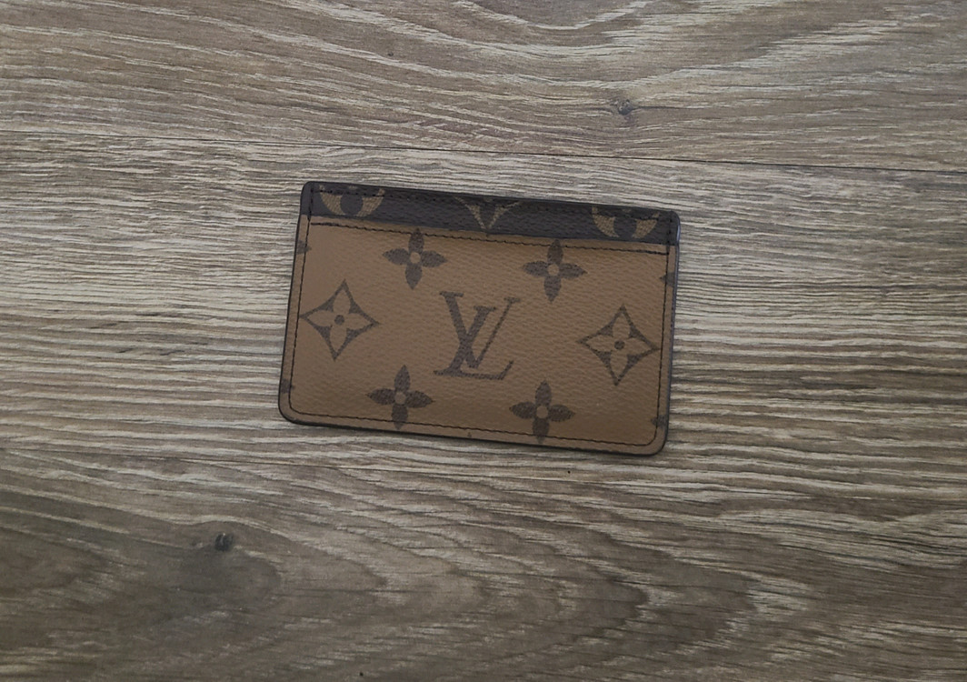 루이비통 모노그램 리버스 카드지갑 명품지갑반지갑프라다디올셀린느샤넬톰브라운고야드에르메스생로랑 이미지