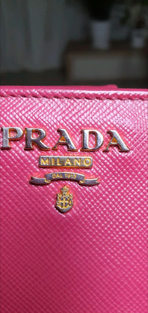 프라다 사피아노 반지갑 핑크 정품A급(보증서O)구찌프라다루이비통디올고야드샤넬셀린느보테가생로랑발렌시아가버버리가방 이미지