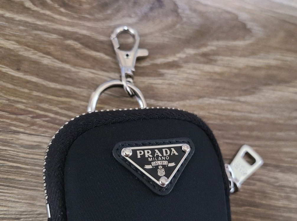 프라다 미니파우치키링파우치나일론가방미니백포켓버킷백복조리테수토호보백크로스백숄더백 구찌루이비통발렌시아가마르지엘라디올셀린 이미지