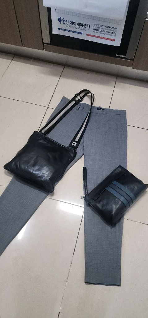 코치 가죽 클러치백/ 보테가베네타 반지갑 이미지