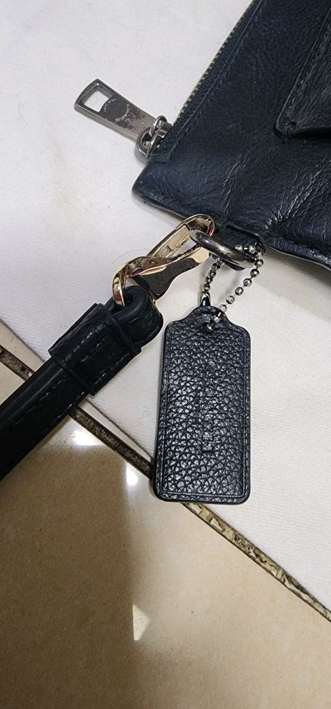 코치 가죽 클러치백/ 보테가베네타 반지갑 이미지