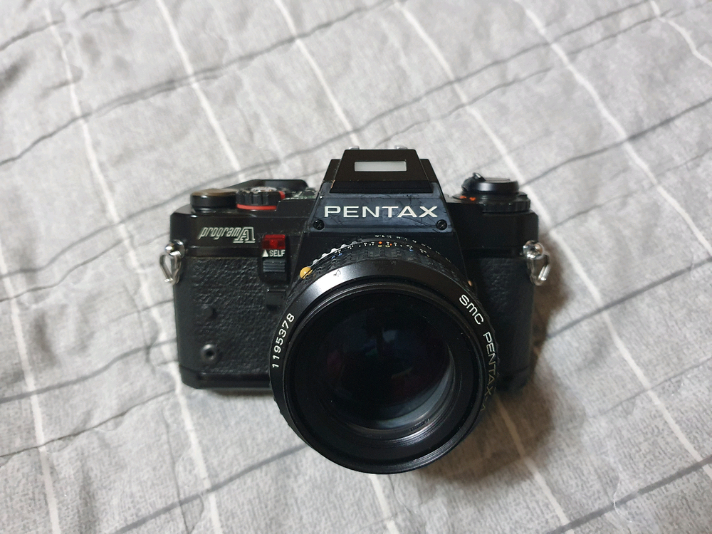 펜탁스 프로그램A 바디및 50mm f1.4렌즈 + 모터드라이버 셋트 입니다 이미지