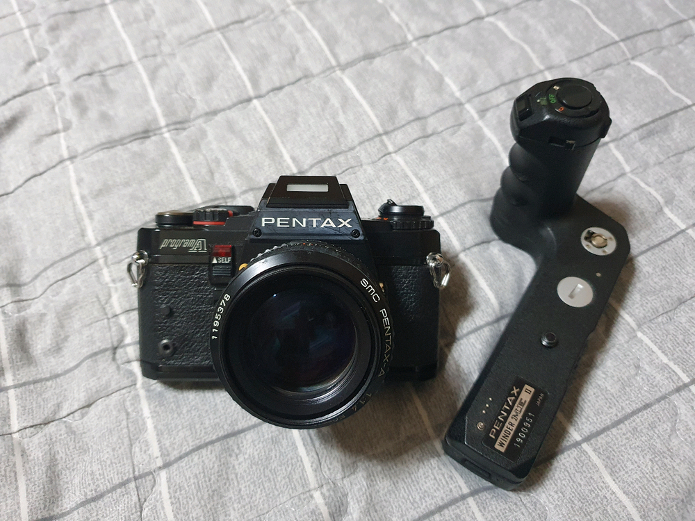 펜탁스 프로그램A 바디및 50mm f1.4렌즈 + 모터드라이버 셋트 입니다 이미지