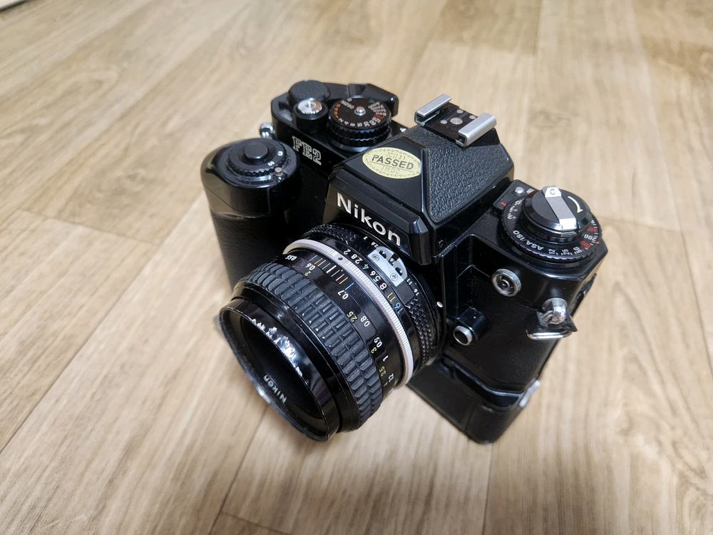 니콘 FE2 바디및 50mm f 2 렌즈 + md-12 모터드라이버 + mr-3 셔터 릴리즈 셋트 판매합니다 이미지