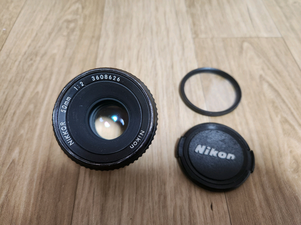 니콘 FE2 바디및 50mm f 2 렌즈 + md-12 모터드라이버 + mr-3 셔터 릴리즈 셋트 판매합니다 이미지