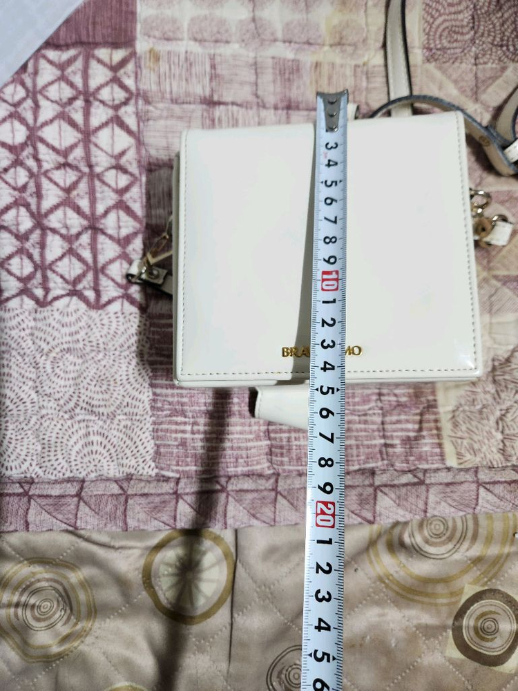 화이트 크로스백 브라비시모 이미지