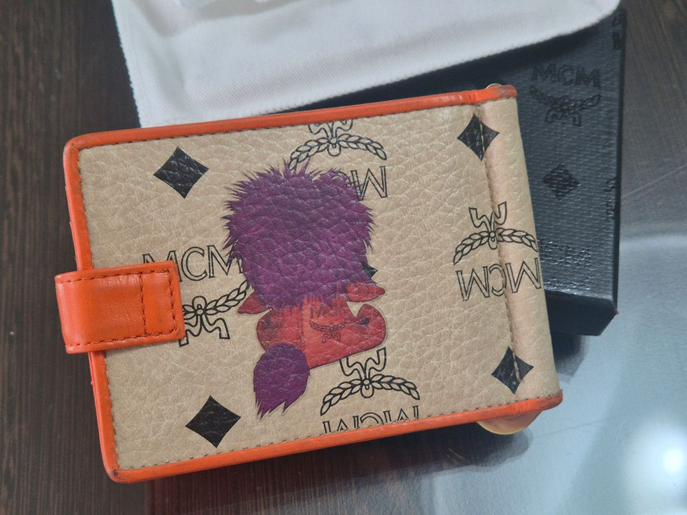 MCM 라이언 오렌지 머니클립 이미지