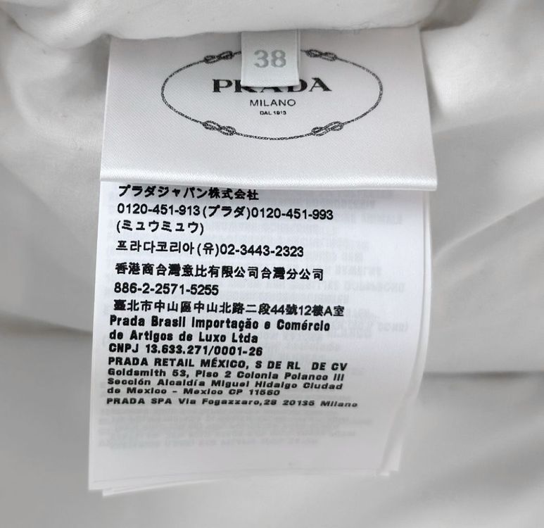 38 프라다 여성 삼각로고 크롭 다운 패딩 자켓 화이트 이미지