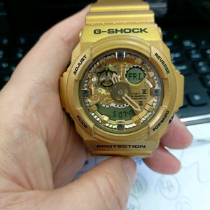 카시오 지샥 금장 시계 이미지