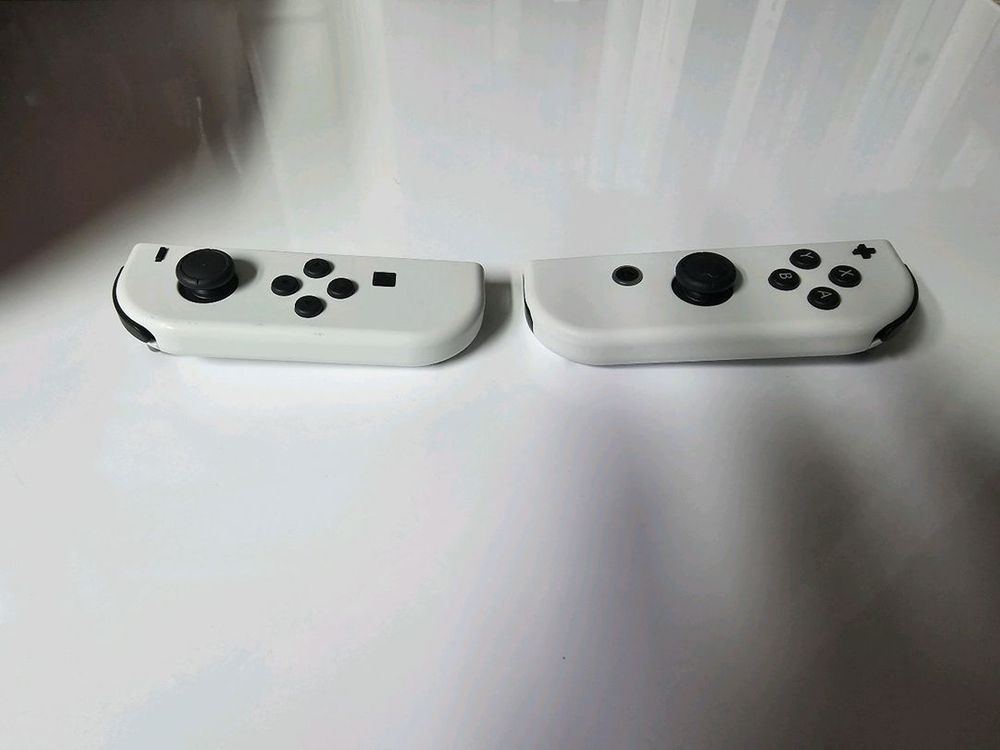 닌텐도 스위치 OLED 화이트 독세트+스컬앤코 그립+케이스 풀구성 이미지