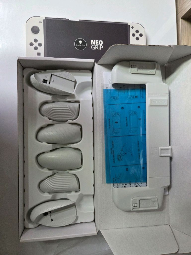 닌텐도 스위치 OLED 화이트 독세트+스컬앤코 그립+케이스 풀구성 이미지