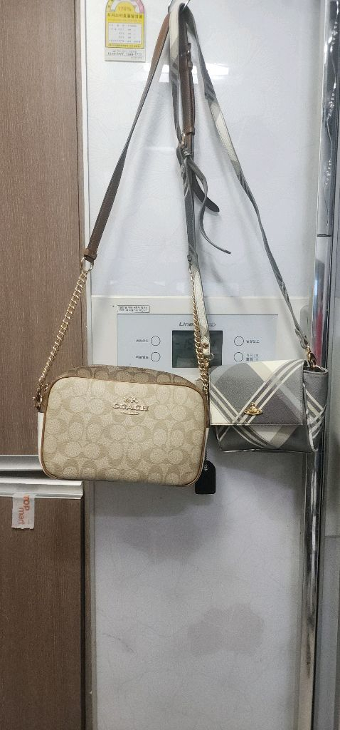 코치 체인크로스백/ 비비안웨스트우드 크로스백 이미지