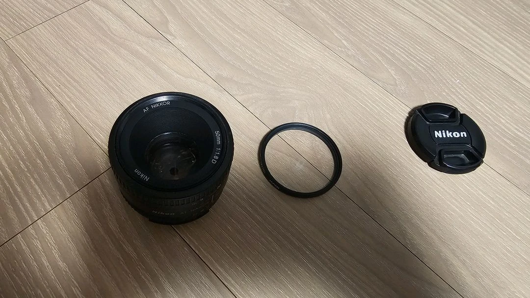 니콘50mm f1.8D 카메라렌즈 호야52mm uv필터 포함 이미지