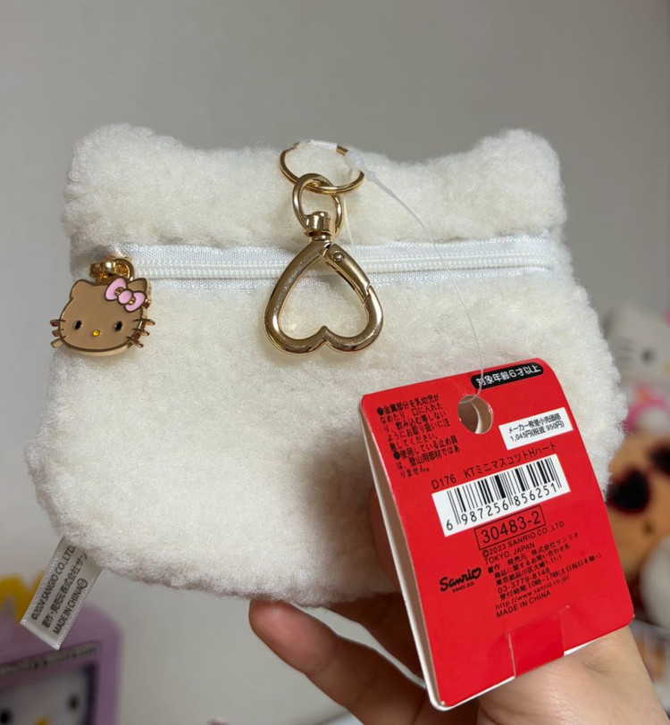 헬로키티 얼굴 뽀글이 파우치 동전지갑 키링 이미지