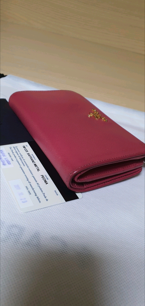 프라다 사피아노 반지갑 핑크 정품A급(보증서O)구찌프라다루이비통디올고야드샤넬셀린느보테가생로랑발렌시아가버버리가방 이미지