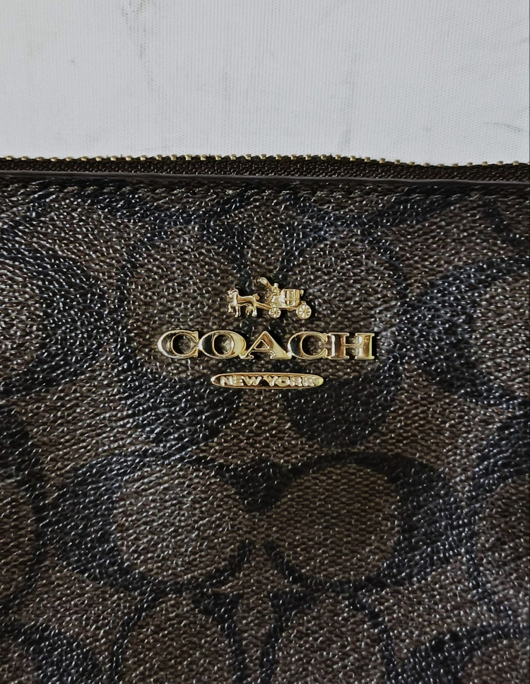 코치 가죽 미니 크로스백 이미지