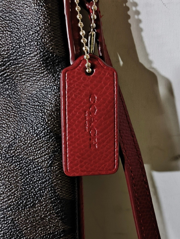 코치 가죽 미니 크로스백 이미지