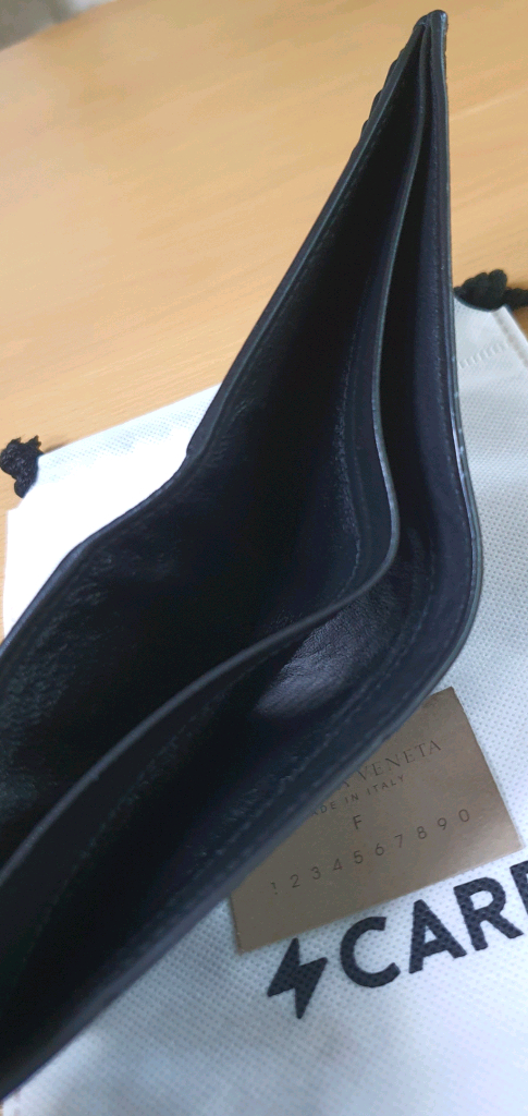 보테가베네타 반지갑 블랙 정품A급(감정O)구찌프라다루이비통디올고야드샤넬셀린느보테가생로랑발렌시아가버버리가방 이미지