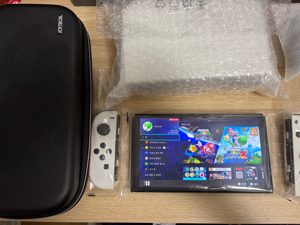 닌텐도 스위치 OLED (풀 구성품, 파우치+여분 보호필름 포함) 이미지