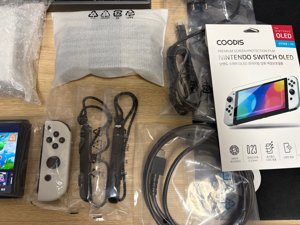 닌텐도 스위치 OLED (풀 구성품, 파우치+여분 보호필름 포함) 이미지