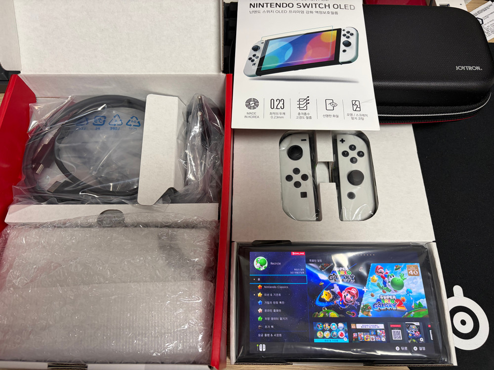 닌텐도 스위치 OLED (풀 구성품, 파우치+여분 보호필름 포함) 이미지