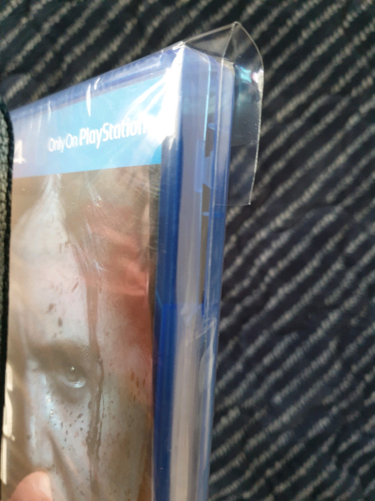 ps4 라스트 오브 어스2 새상품(케이스 비닐 하자있음) 이미지