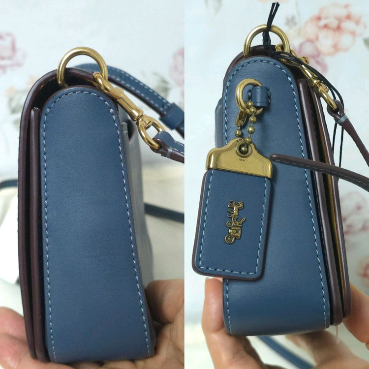 택새것)코치 딘키 크로스 바디백 이미지