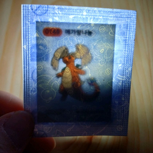포켓몬시즌5띠부씰 메가망나뇽 판매합니다 이미지