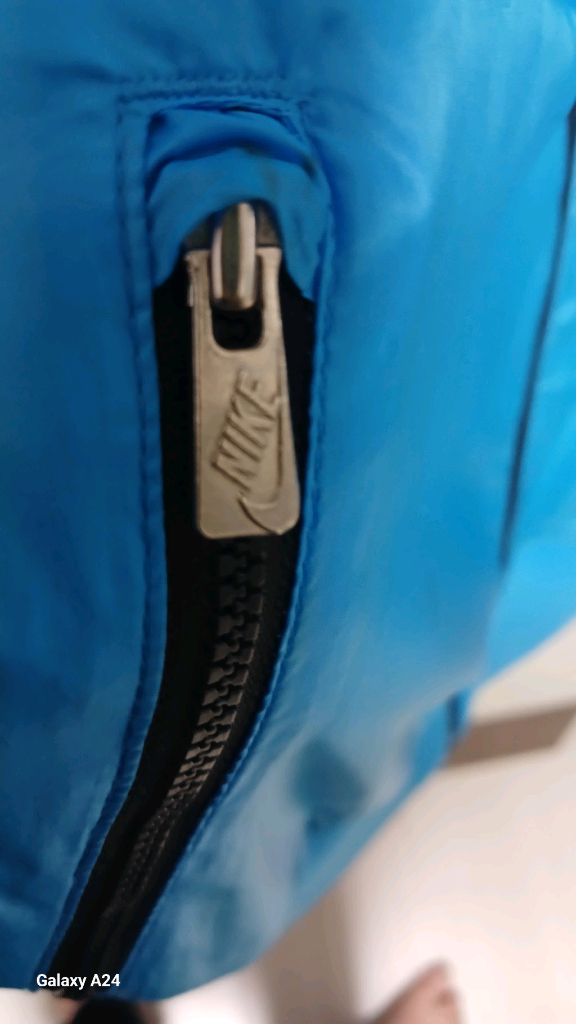 나이키 윈드러너 러닝 후드 윈드스토퍼 바람막이 재킷 사이드 지퍼 포켓 블루(XL)나이키(Nike)의 클래식 윈드러너 이미지