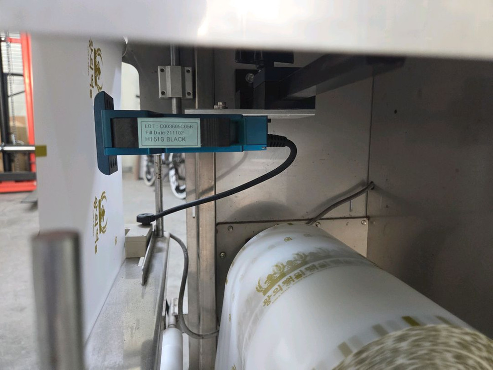 떡포장기 삼면포장기계 (아이솔루션 HP220-TJ2.5 산업용 마킹기)포함 이미지