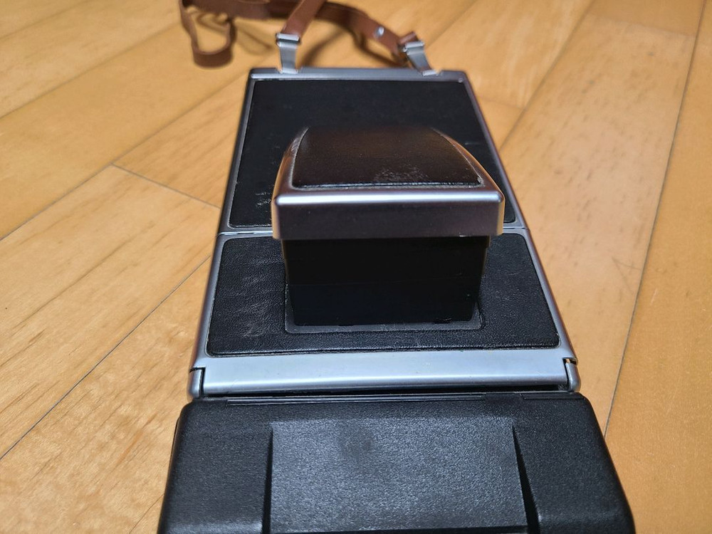 폴라로이드 SX-70 Sonar 네고 가능 영화 광고 이미지