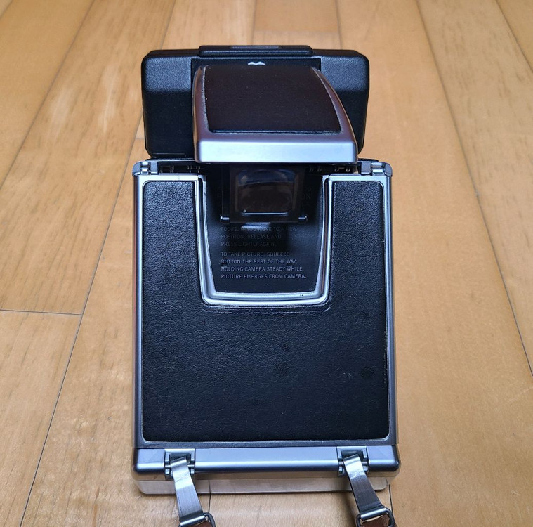 폴라로이드 SX-70 Sonar 네고 가능 영화 광고 이미지