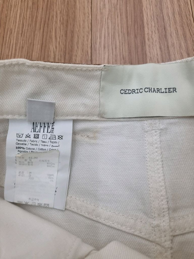 한섬 cedirc charlier 아이보리 미디 스커트 25인치 세드릭 샬리에 이미지