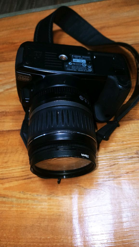 DSLR 카메라 세트 캐논 DSLR 126151카메라와 올림푸스 삼각대 세트로 저렴하게 판매합니다. 충전기 포함. 이미지