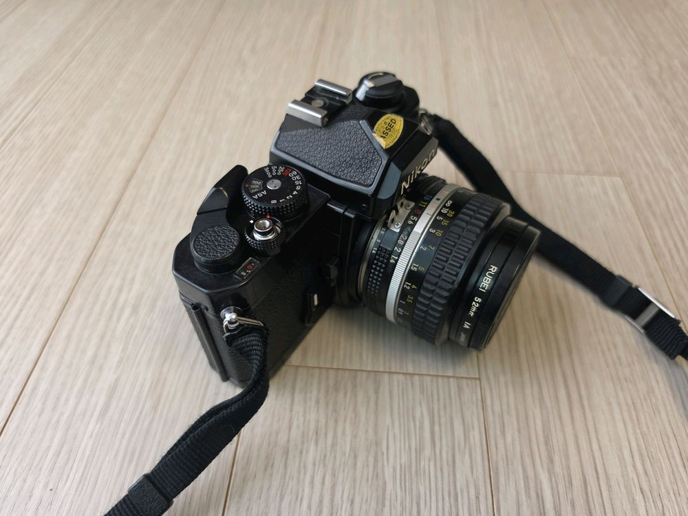니콘 fm 50mm f1.4 필름카메라 판매합니다 이미지