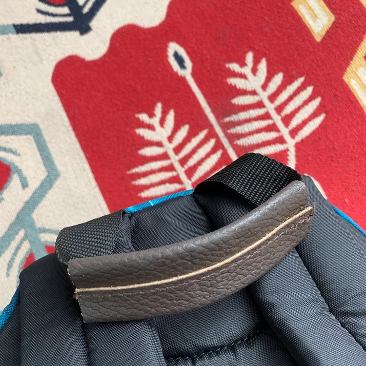 EASTPAK 이스트팩 와이오밍 가죽 배색 플라워 백팩 가방 이미지