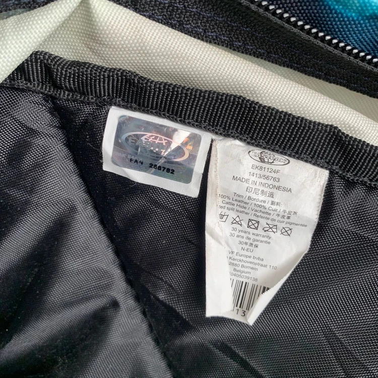 EASTPAK 이스트팩 와이오밍 가죽 배색 플라워 백팩 가방 이미지