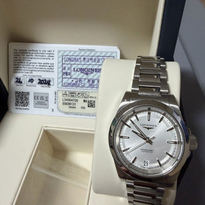 론진 콘퀘스트 화이트 34mm 여성시계 이미지