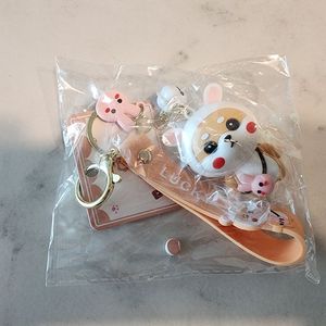 [키링] 토끼 귀 모자를 쓴 분홍색 토끼 가방을 멘 귀여운 시바견 캐릭터 키링 (정품, 새제품) 이미지