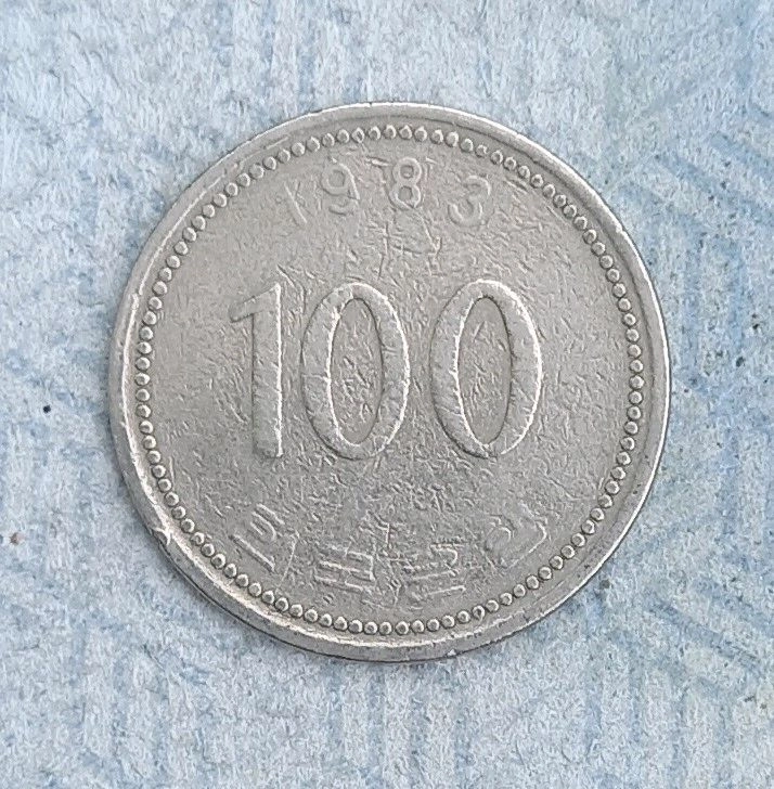 1983년 100원 티타늄동전 이미지