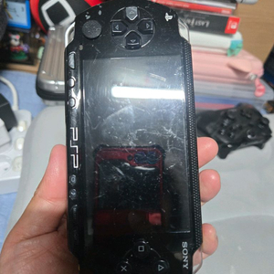 psp-1005블랙+게임칩 팝니다~~ 이미지