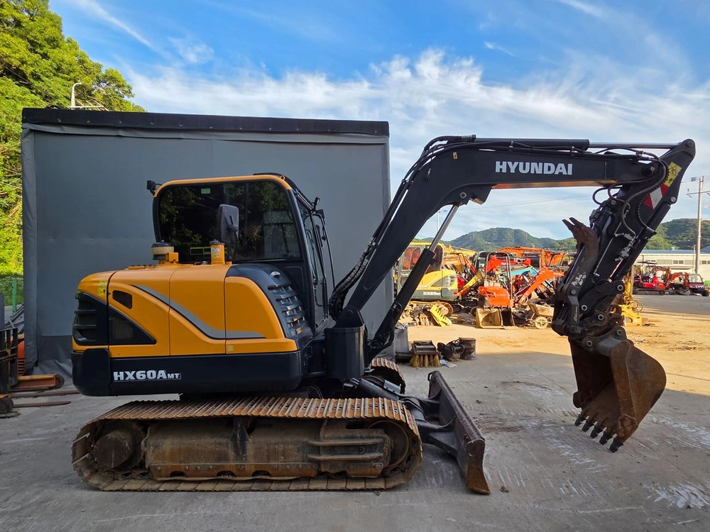 현대 02굴삭기 HX60MT 20년식 코끼리집게장착회전라인 이미지