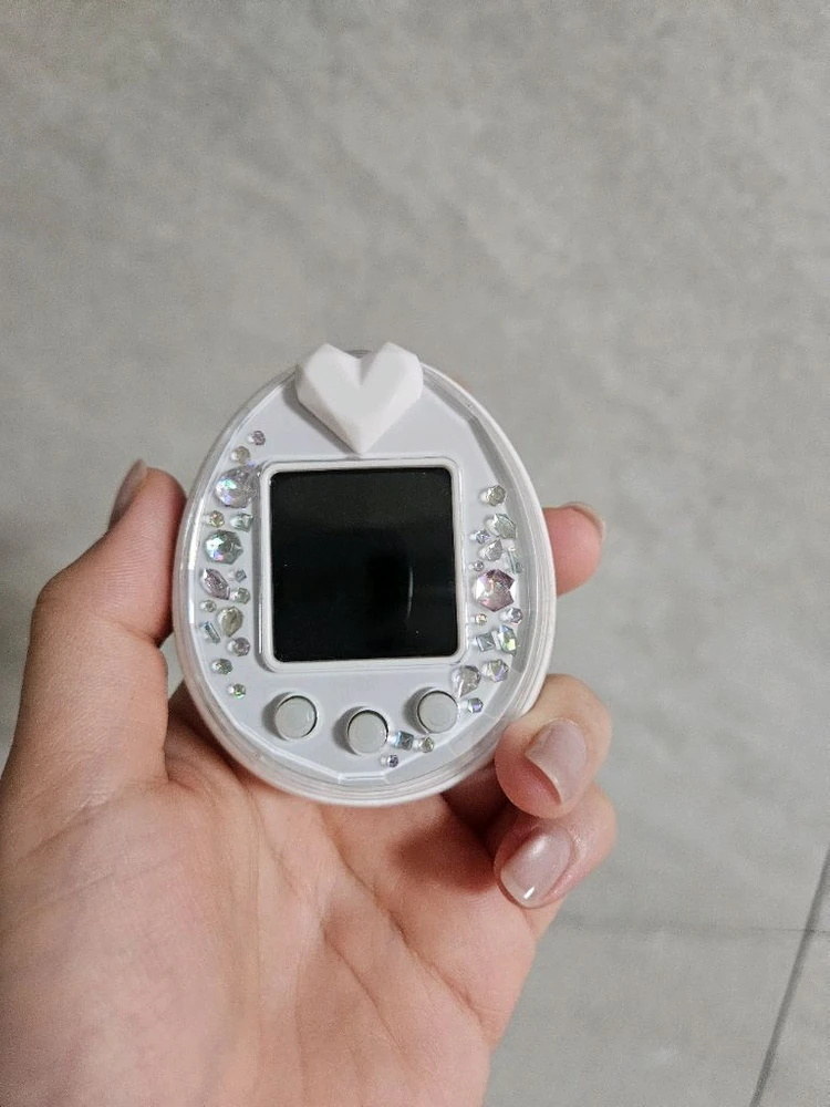 반다이 다마고치 피스화이트 고전토이 빈티지토이 게임기 판매합니다. 이미지